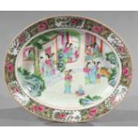 Chinese Famille Rose Porcelain Oval Platter , 19th c., decorated with a central scene of ladies