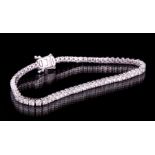 14 kt. White Gold and Diamond Tennis Bracelet , 64 prong set round brilliant cut diamonds, total wt.