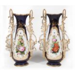 Pair of Paris Polychrome and Gilt Porcelain Vases , late 19thc., foliate-molded handles, painted