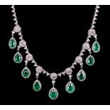 18 kt. White Gold, Diamond and Emerald Necklace , 9 pear shaped emeralds, total wt. approx. 19.93