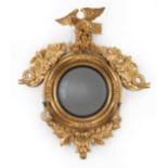 Regency Carved and Gilded Girandole Mirror , early 19th c., surmounted by an eagle atop scrolling