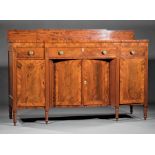American Federal Carved Mahogany Sideboard , early 19th c., Philadelphia, banded shaped