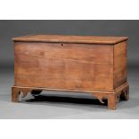 American Carved Walnut Blanket Chest , early 19th c., two-board hinged top, interior compartment,