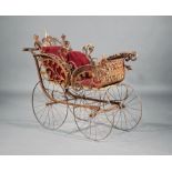 Victorian Wicker Baby Carriage , 19th c., steel wheels and suspension , h. 38 in., w. 52 in., d.