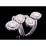 18 kt. White Gold and Diamond Four Row Ring , 2 marquise cut and 2 round brilliant cut diamonds,