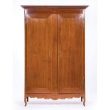 Louisiana Carved and Inlaid Mahogany Armoire , early 19th c., later molded cornice, flush panel
