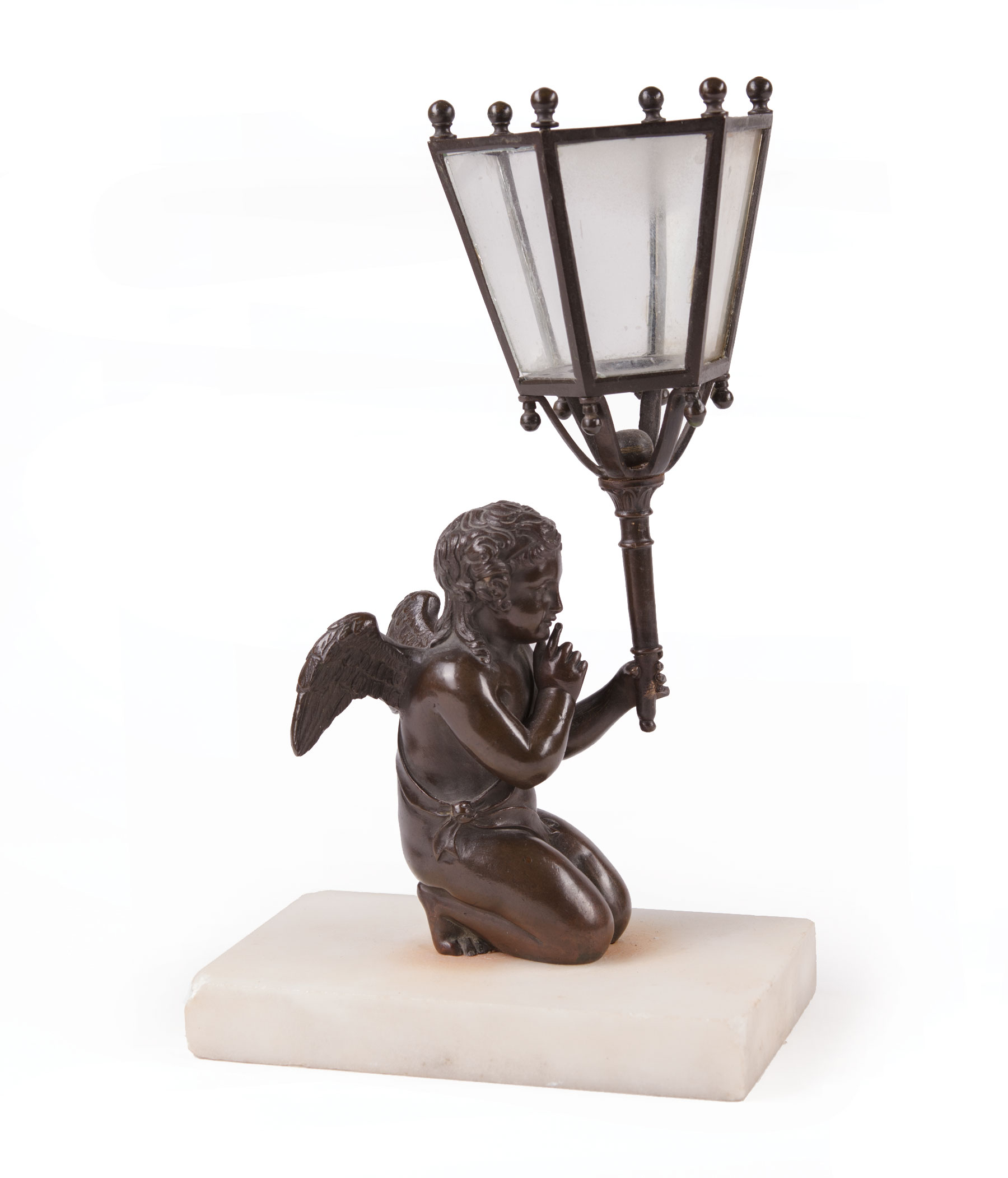 Continental Patinated Bronze Figural Candleholder , modeled as a winged putto, marble base, h. 9 in