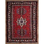 Persian Heriz Carpet , red ground, triple medallions, 3 ft. 9 in. x 5 ft. 5 in