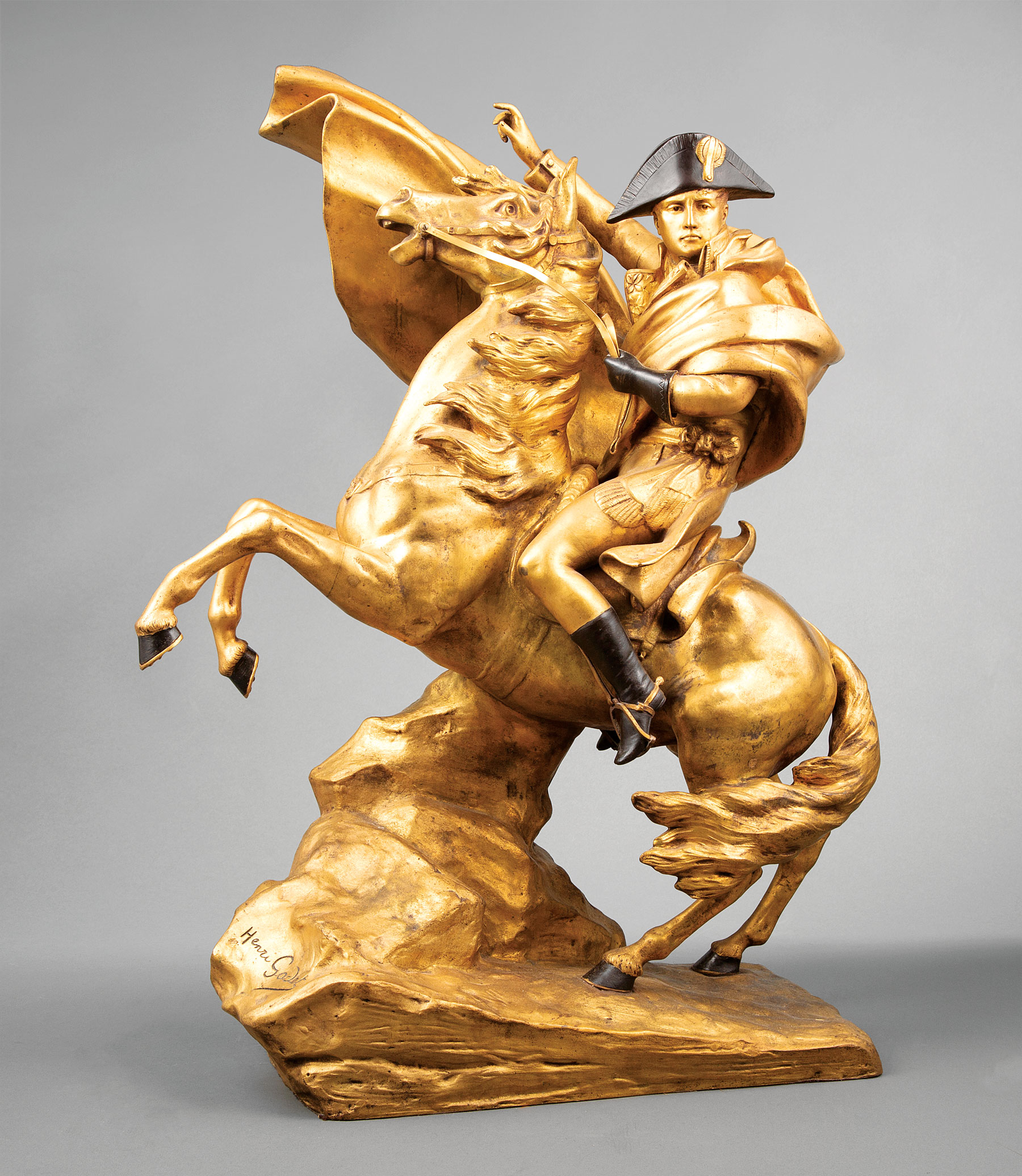 Henri Godet (French, 1863-1937) , "Napoleon Crossing the Alps", gilt and patinated bronze, signed