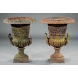 Pair of American Cast Iron Urns , 19th c., en suite with previous lot, h. 24 1/2 in., dia. 19 1/2 in