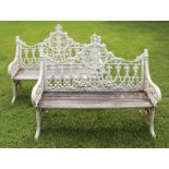Pair of American Cast Iron Benches , 19th c., gothicized motifs, wood slatted seat, h. 36 1/2 in.,