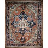 Serapi Rug , red and cream ground, central medallion, blue border, overall stylized floral design,
