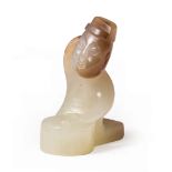 Chinese Han-Style Celadon and Russet Jade Figure of a Musician , carved kneeling before a drum, h. 1