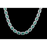 14 kt. White Gold, Emerald and Diamond Necklace , 41 prong set rectangular step cut natural