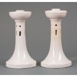 Pair of Newcomb College Art Pottery Candlesticks , decorated with geometric cut-outs, white high