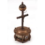 Continental Turning Ball Shelf Clock , 20th c., dial sphere, crucifix standard, base with continuous