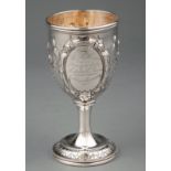 American Coin Silver Repoussè Goblet , mid-19th c., unmarked, floral and grape decoration, cartouche