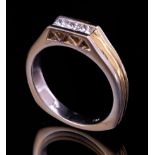 18 kt. Yellow and White Gold and Diamond Man's Ring , channel set with 3 princess-cut diamonds,