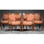 Six Restauration Carved and Gilded Fruitwood Armchairs , padded back, shaped arms terminating in