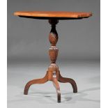 American Classical Carved Mahogany Tilt-Top Candlestand , early 19th c., shield-shaped top, spiral-