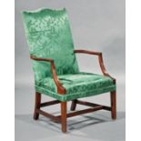 American Federal Carved Mahogany Lolling Chair , early 19th c., serpentine crest rail, shaped