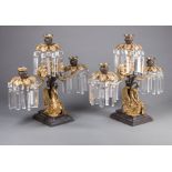 Pair of Continental Gilt and Patinated Bronze Three-Light Girandoles , foliate prism rings,