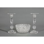 Pair of Cut Crystal Candlesticks and Bowl , h. 12 1/2 in. and h. 5 in., dia. 10 in . Provenance: