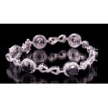 14 kt. White Gold, Black Diamond and Diamond Bracelet , 6 round brilliant cut black diamonds, 7.8-