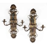 Pair of Regence-Style Gilt Bronze Three-Light Wall Sconces , foliate shell crests, backplates