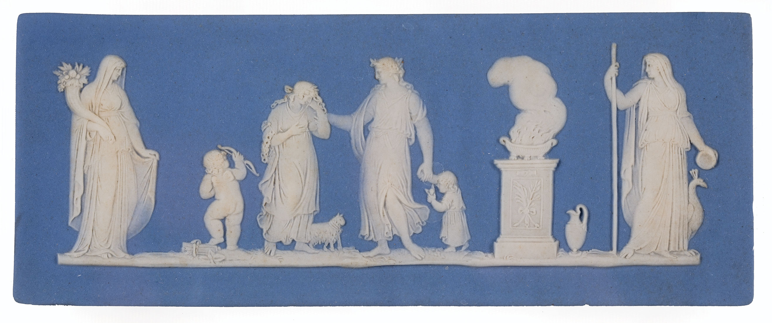 English Jasperware Plaque , 19th c., Classical figures, float-mounted, framed, 2 1/4 in. x 5 3/4