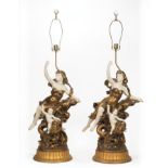 Pair of Large French Painted Metal Figural Lamps , 20th c., with nymph and cherub riding a