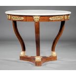French Bronze-Mounted and Gilt Mahogany Center Table , 19th c., dished marble top, scrolled legs,