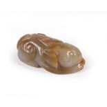Chinese Celadon and Russet Jade Figure of a Recumbent Cat , l. 2 5/8 in