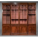 George III Carved Mahogany Breakfront , early 19th c., stepped cornice, Gothicized doors, shelf