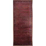 Semi-Antique Persian Hall Runner, red ground, overall stylized foliate design, 6 ft. 6 in. x 15