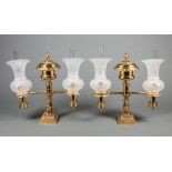 Pair of English Gilt Bronze Double Argand Lamps, c. 1830, griffin supports, h. 17 1/4 in., w. 17