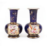 Pair of Sevres-Style Polychrome and Gilt Porcelain Bottle Vases, 19thc., decorated with flower