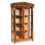 Antique Biedermeier-Style Parcel Gilt and Ebonized Fruitwood Vitrine, molded pedimented top, stepped