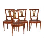 Four Directoire-Style Parcel Gilt Fruitwood Chairs, late 19th c., scrolled crest rail, feather