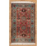 Antique Persian Rug, red ground, teal border, stylized floral design, 3 ft. x 5 ft