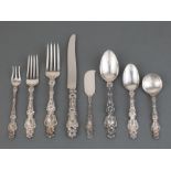 Whiting "Lily" Sterling Silver Flatware Service, pat. 1902, incl. 9 forks, (l. 7 5/8 in.), 8 knives,