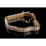 14 kt. Yellow Gold and Diamond Flexible Bracelet, set with 126 full cut diamonds, total wt.