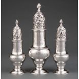 Suite of George II Sterling Silver Castors, incl. large and near pair of smaller, Jabez Daniell,