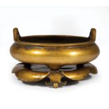 Chinese Gilt Bronze Tripod Censer and Stand, 20th c., bombe body, loop handles, base with Xuande