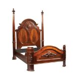 American Rococo Carved Rosewood Bedstead, mid-19th c., arched cornice, turned finials, paneled