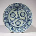 Japanese Blue and White Porcelain Charger, probably 19th c., decorated with 3 central rabbit