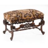 Louis XIV-Style Carved Walnut Bench, needlepoint upholstery, shaped apron, scroll carved stiles,