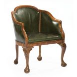 George III-Style Carved Mahogany and Leather Armchair, early 20th c., arched crest rail, barrel