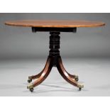Regency Inlaid Mahogany Breakfast Table, early 19th c., tilt top, turned standard, four sabre