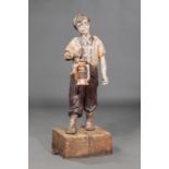 American Cast Iron Figural Hitching Post, 19th c., modeled as a boy standing on a hay bale, h. 44